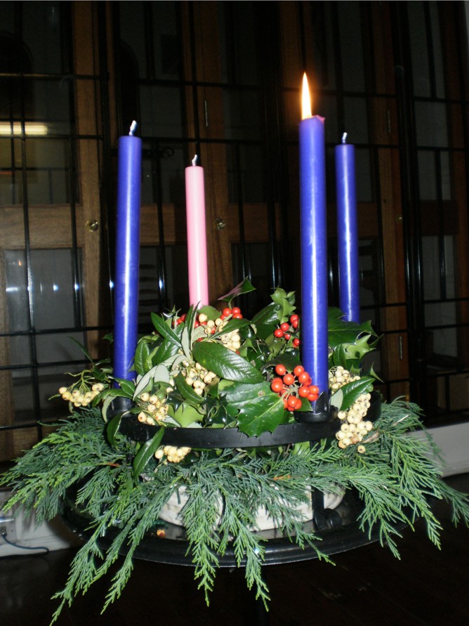 One of ou Advent wreaths with the first candle lit One of ou Advent wreaths with the first candle lit