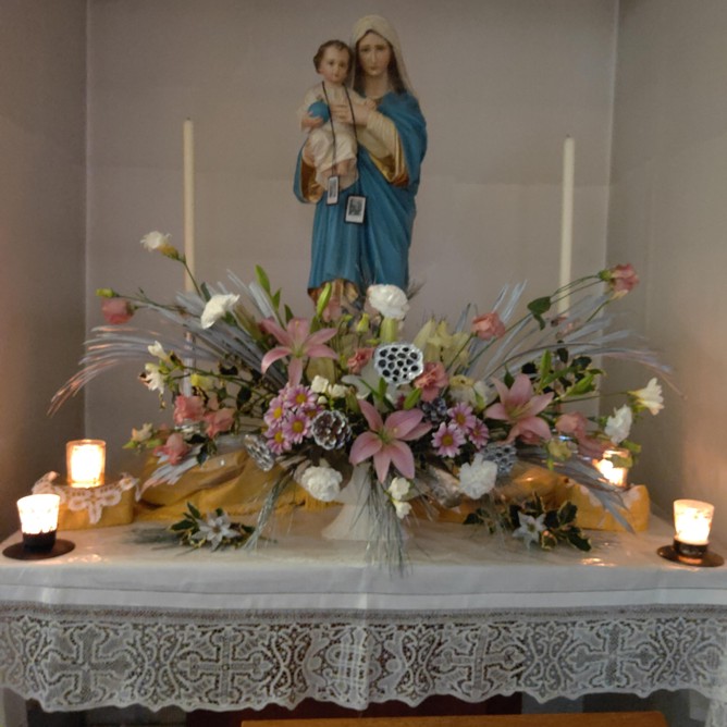 Our Lady's altar in our chapel decorated for Christmas