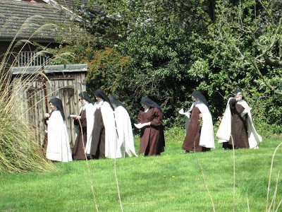 Procession passing St. Joseph's house