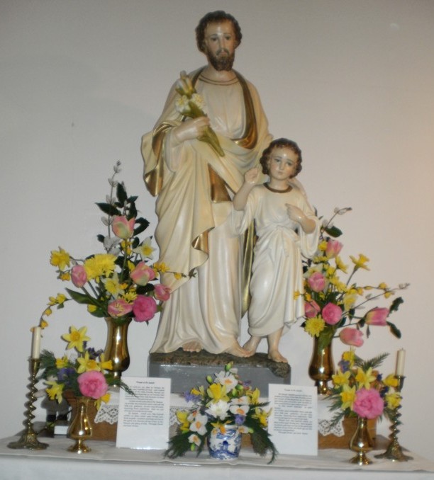 Statue of Saint Joseph decorated for his Feast Day